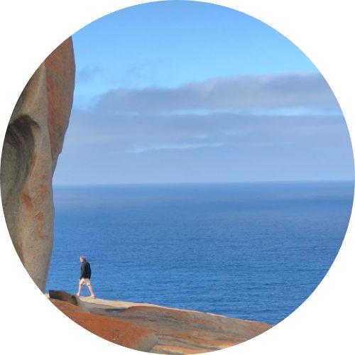 Man walking on rocks at Noosa